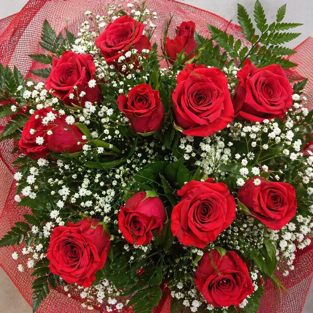 Mazzo Di Rosse bouquet with fresh red flowers arranged beautifully for romantic gift and special occasions in Milano