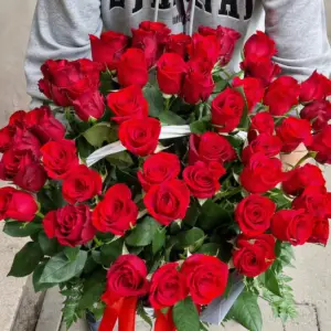 Red loves bouquet of fresh red flowers arranged for romantic gift, love, and special occasions in Milano