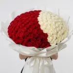 Red Rosa White bouquet with fresh red and white roses arranged elegantly for romantic gift and special occasions in Milano