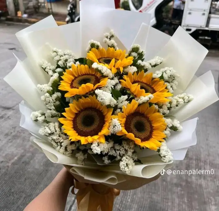 Sunflower with Gypso fresh bouquet with bright sunflowers and gypsophila symbolizing joy, positivity, and elegant floral gifting.