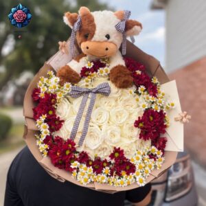 Gift Bouquet with Doll floral gift arrangement for birthdays and special occasions in Milan