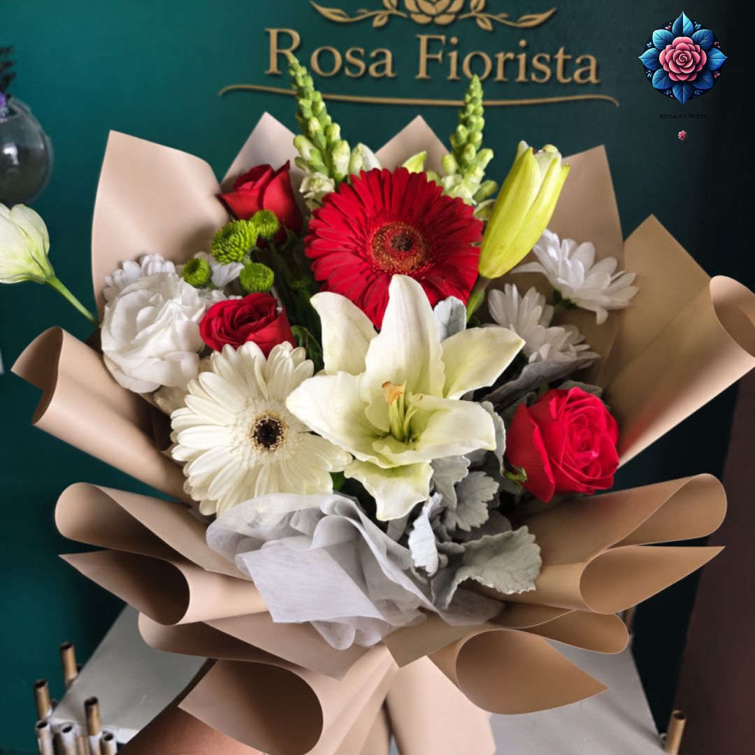 Mix Bouquet 035 with red roses, white lilies, red and white gerberas, and beige wrapping from Rosa Fiorista Milano.