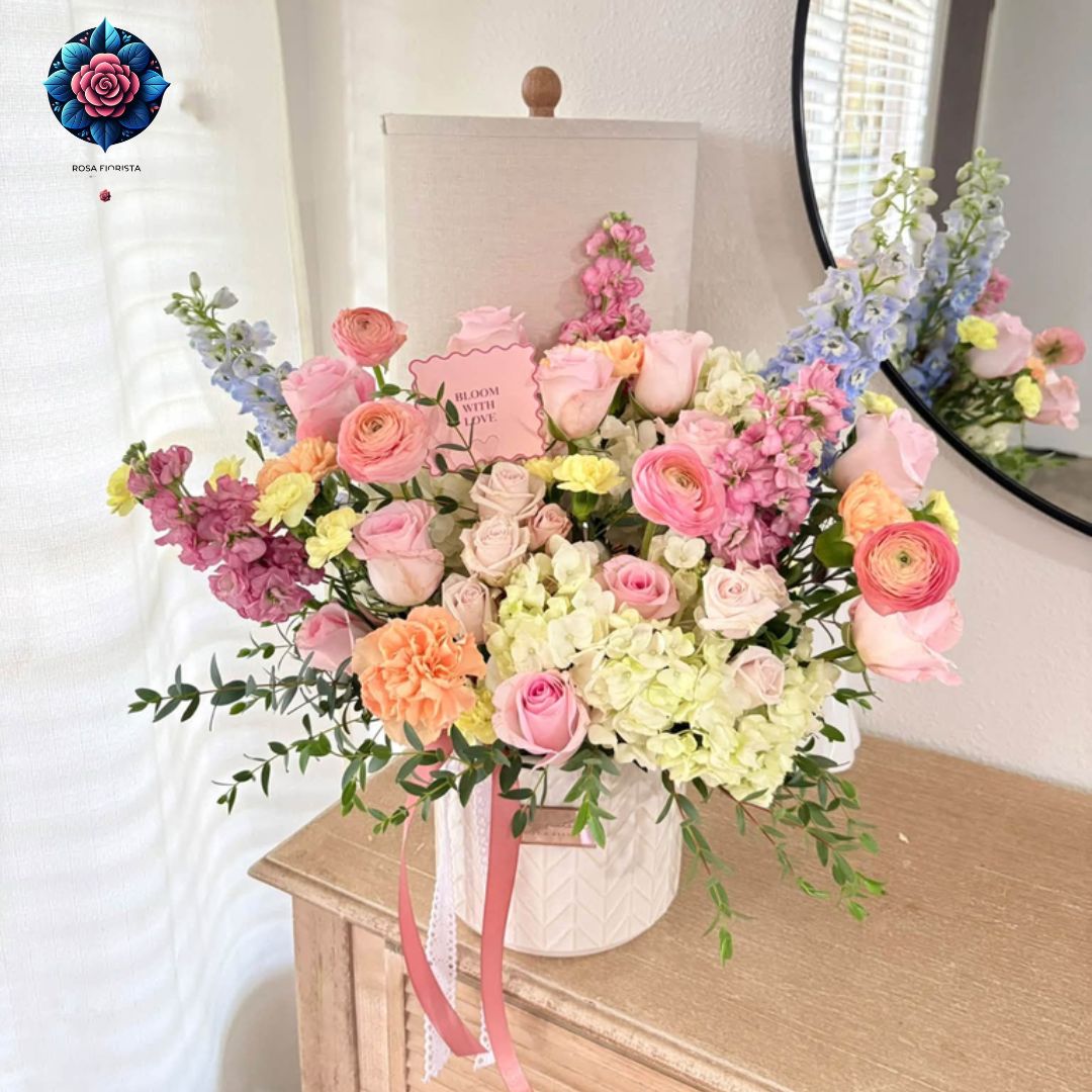 Image ALT Text: Mix Bouquet Roses Luxury with pink roses, ranunculus, cream hydrangeas and pastel flowers in Milan