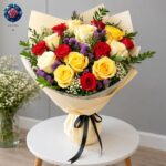 Mix Rose Bouquet for Gift with red and yellow roses, purple filler flowers, white gypsophila and greenery in elegant cream wrapping.